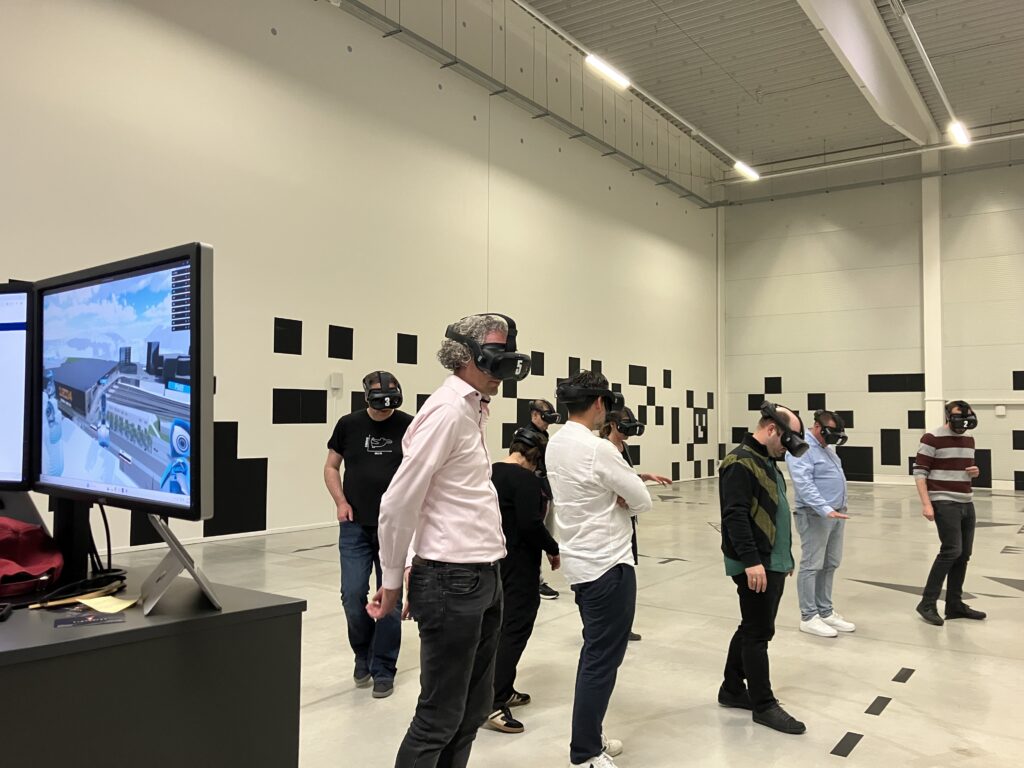 Participants explore a 3D city model in the Virtuplex VR hall during the 5CC+ meeting